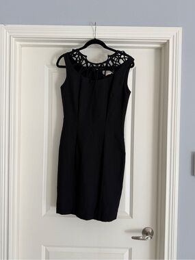 Sleeveless Black Mini Dress with Decorative Cutout Yoke